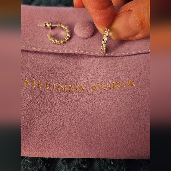 Melinda Maria "Baby Shes An Icon" Silver Huggie Hoop Earrings - Picture 3 of 3